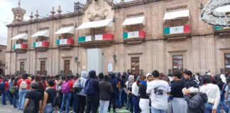 Se cumplen 11 años de la desaparición de los normalistas de Ayotzinapa; marchan estudiantes en Morelia